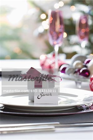 Small gift box with name tag on dining table