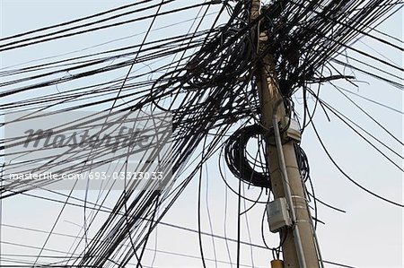 Tangle of Electrical Wires on Power Pole - Stock Photo - Masterfile -  Premium Royalty-Free, Code: 693-03313033