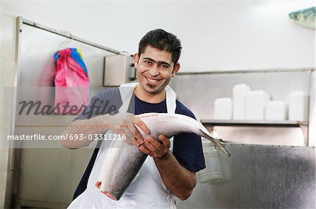 Butcher with Fresh Fish