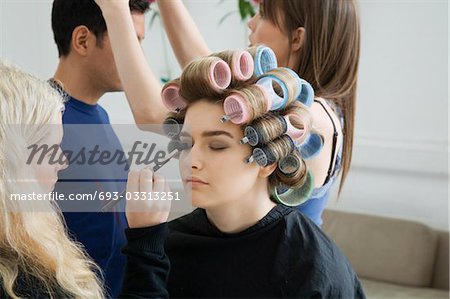 Models Being Prepared for Photo Shoot