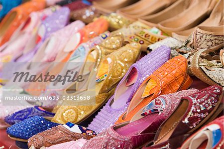 Dubai, UAE, Colorful women’s sandals made of camel skins are for sale in the Bur Dubai souq.