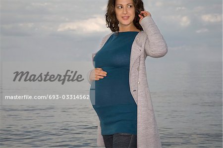 Pregnant woman at ocean