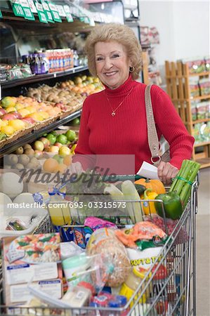 Senior woman grocery shopping