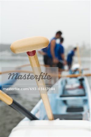 Sea kayak racing team prepare their boat