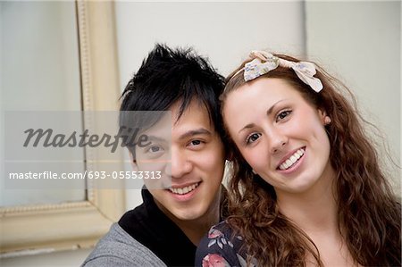 Portrait of happy young couple