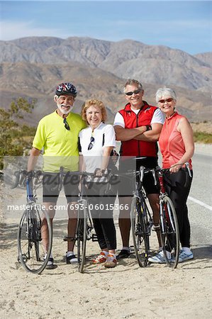 Two couples on bicycle ride, group portrait