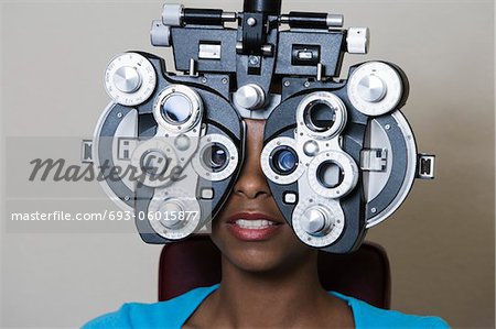 Patient having eyes examined