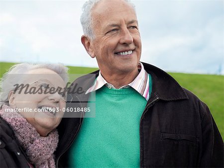 Senior couple embracing outdoors