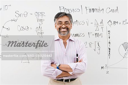 Scientist Standing in Front of Whiteboard