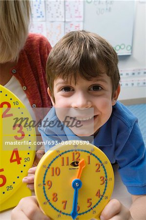 Little Boy Learning to Tell Time