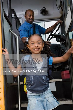 Little Girl Getting off of Schoolbus