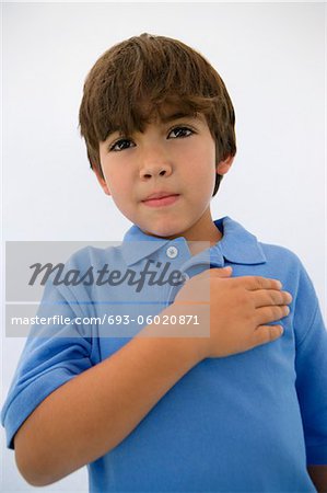 Boy with Hand Over Heart