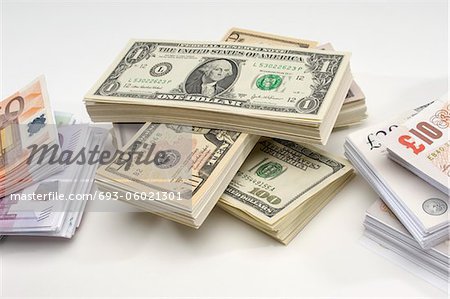 Stack of US and European Currency