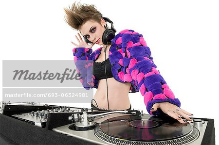 Portrait of beautiful DJ over white background Portrait of beautiful DJ over white background