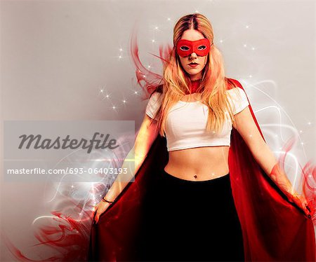 Portrait of a young woman dressed as superhero