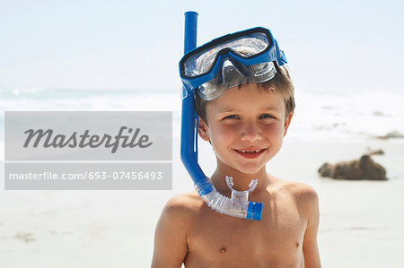 Boy With Snorkel on Beach