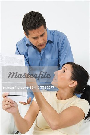 Couple Looking at Tax Form