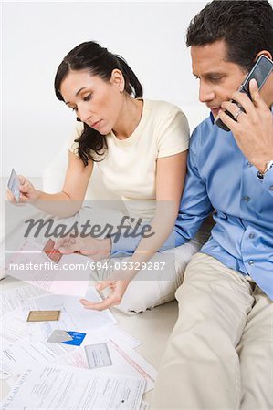 Couple Holding Credit Cards