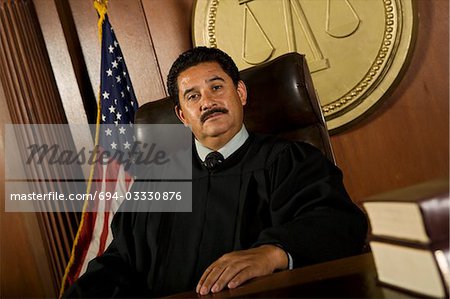 Judge sitting in court, portrait