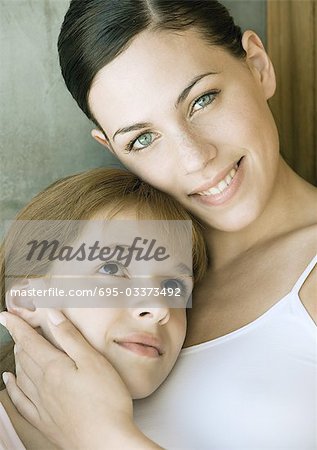 Woman resting head on man's chest, … – License image – 70507939 ❘ lookphotos
