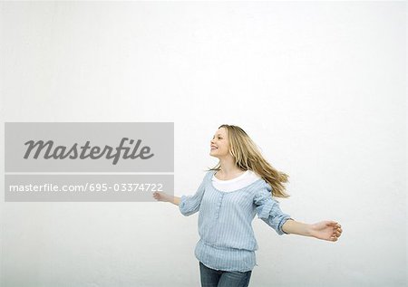 Teenage girl dancing, portrait