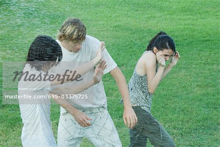 Young friends getting wet