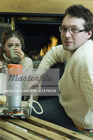 young man or teenager drinking water from bottle Stock Photo