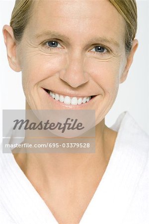 Mature woman smiling at camera, portrait