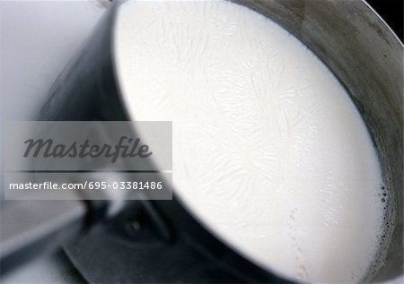 Milk in saucepan, close-up