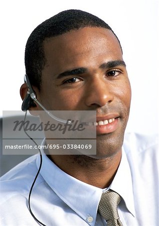 Man wearing headset, close-up, portrait