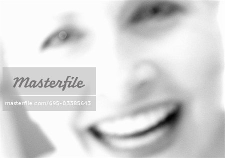 Mature woman smiling, close-up, portrait, blurred, b&w