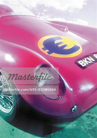 Euro sign on hood of sports car. Euro sign on hood of sports car.