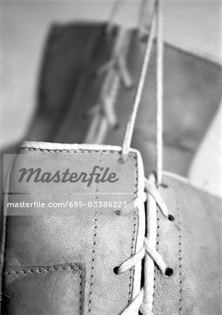 Boxing gloves, close-up, b&w.