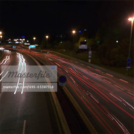 Freeway at night with light trails, elevated view, long exposure