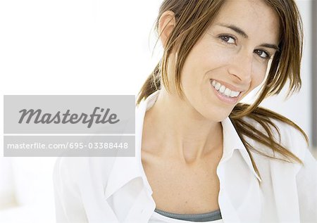 Mid-adult woman smiling, portrait