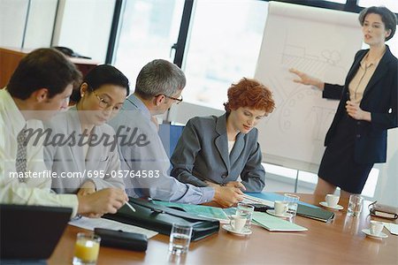 Woman giving business presentation