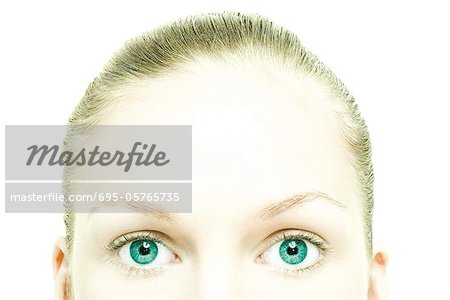 Young woman's eyes and forehead, extreme close-up