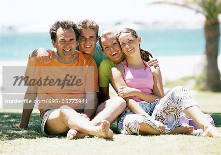 Family portrait at the beach, front view.