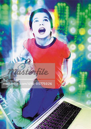 Child emerging from laptop entering into cyberspace, man lifting child, digital composite.
