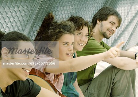 Group of friends, one pointing
