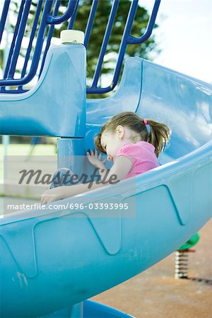 Child on playground equipment