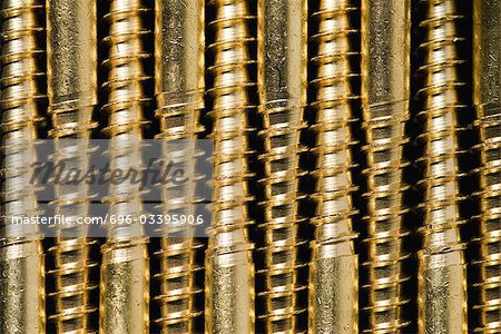 Screws lined up, extreme close-up Screws lined up, extreme close-up