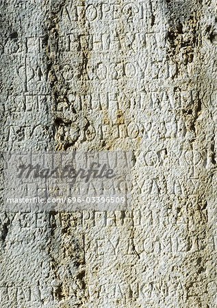 Ancient Greek manuscript engraved in stone.
