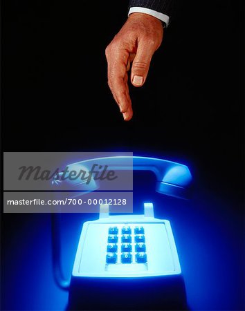 Hand Reaching for Telephone