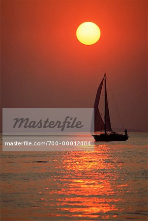 Silhouette of Sailboat at Sunset Aegina, Greece
