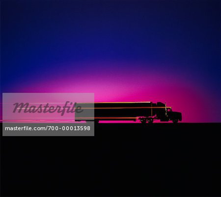 Silhouette of Transport Truck With Light Trails