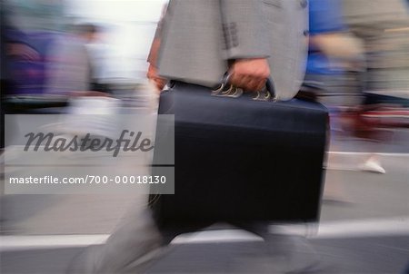 Blurred View of Businessman Walking