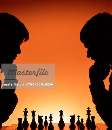 two people playing chess