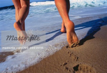 Couple's Feet Running on Beach Todos Santos, Baja, Mexico