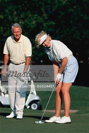 Mature Couple Golfing, Deer Creek Golf Club, Deerfield Beach Florida, USA